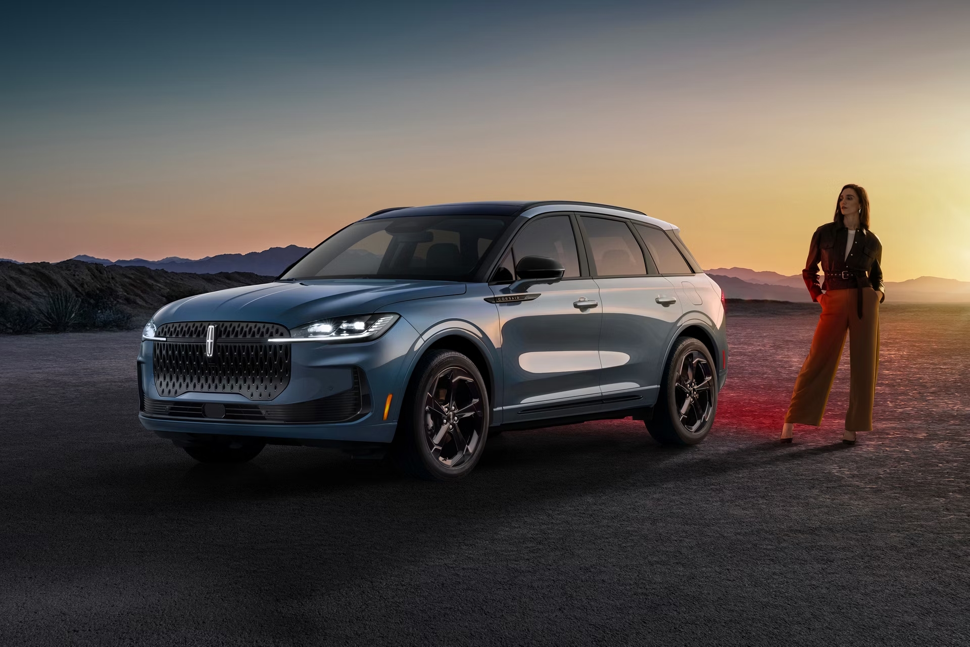 Luxurious car interior with tan leather seats, panoramic sunroof, and digital dashboard.